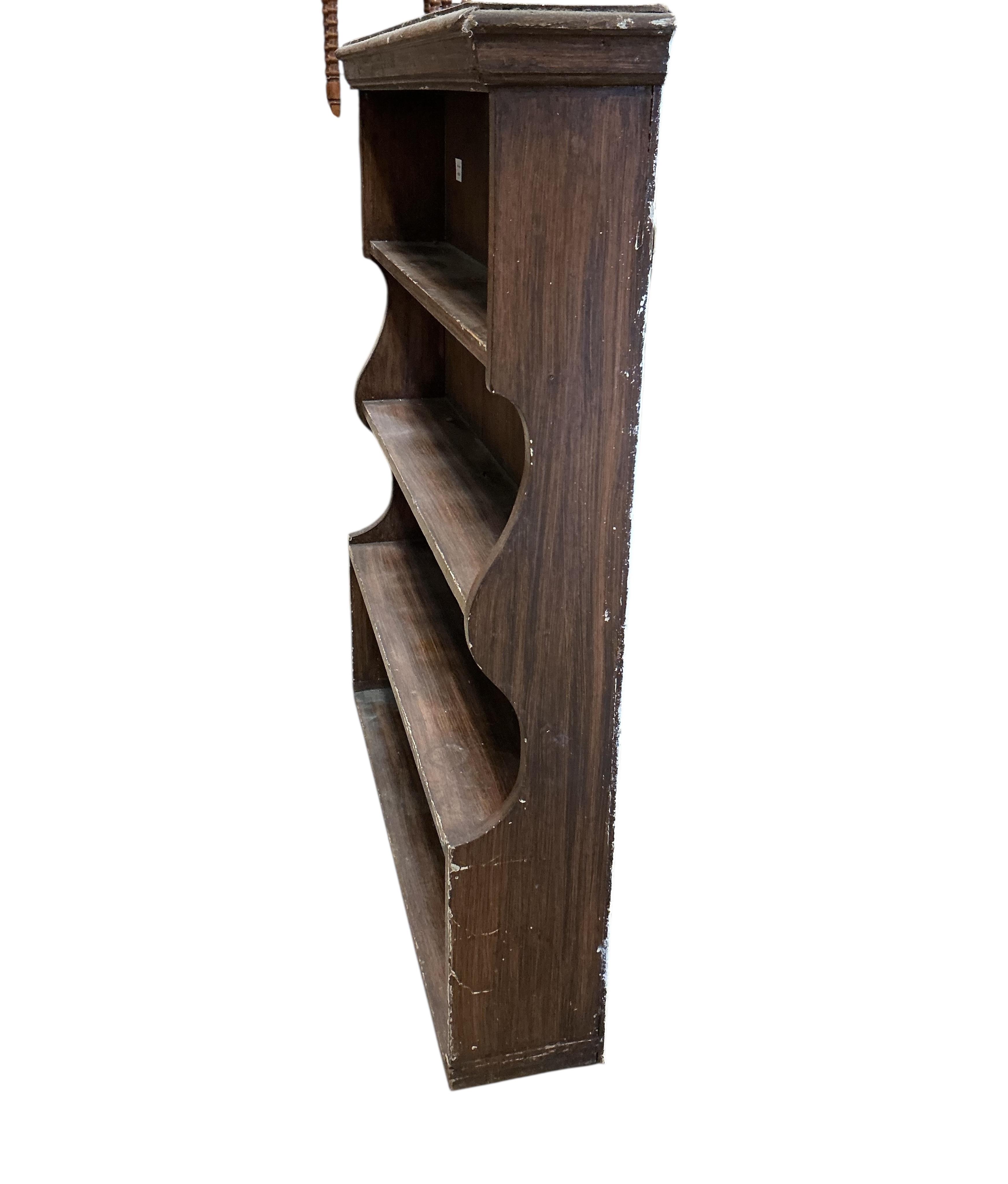 A 19th century plate rack, with painted simulated grain, width 96cm, depth 19cm, height 113cm